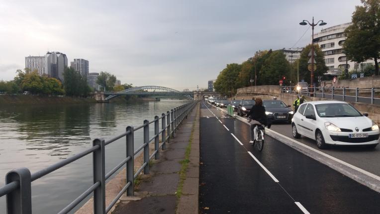 Photo of a bike path and a road